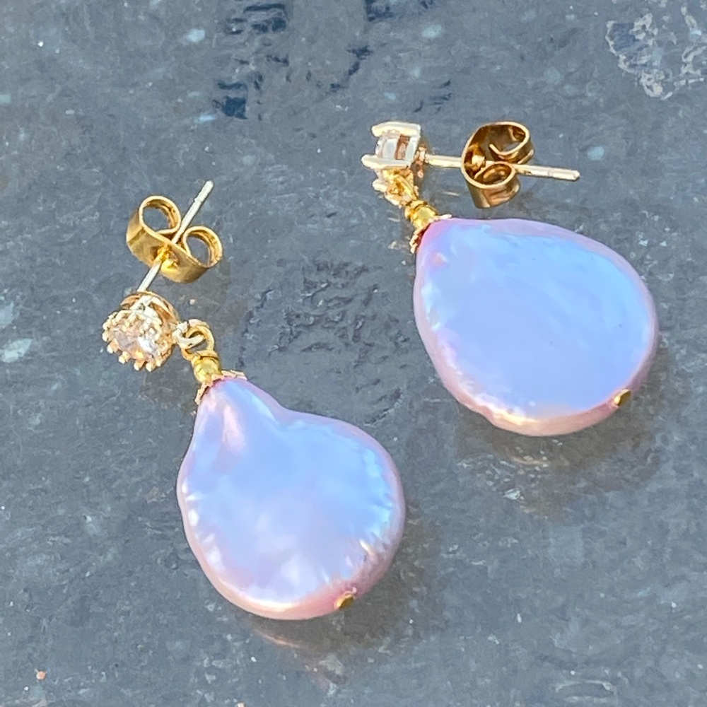 Exquisite Natural Pearl drop earring on CZ stud.